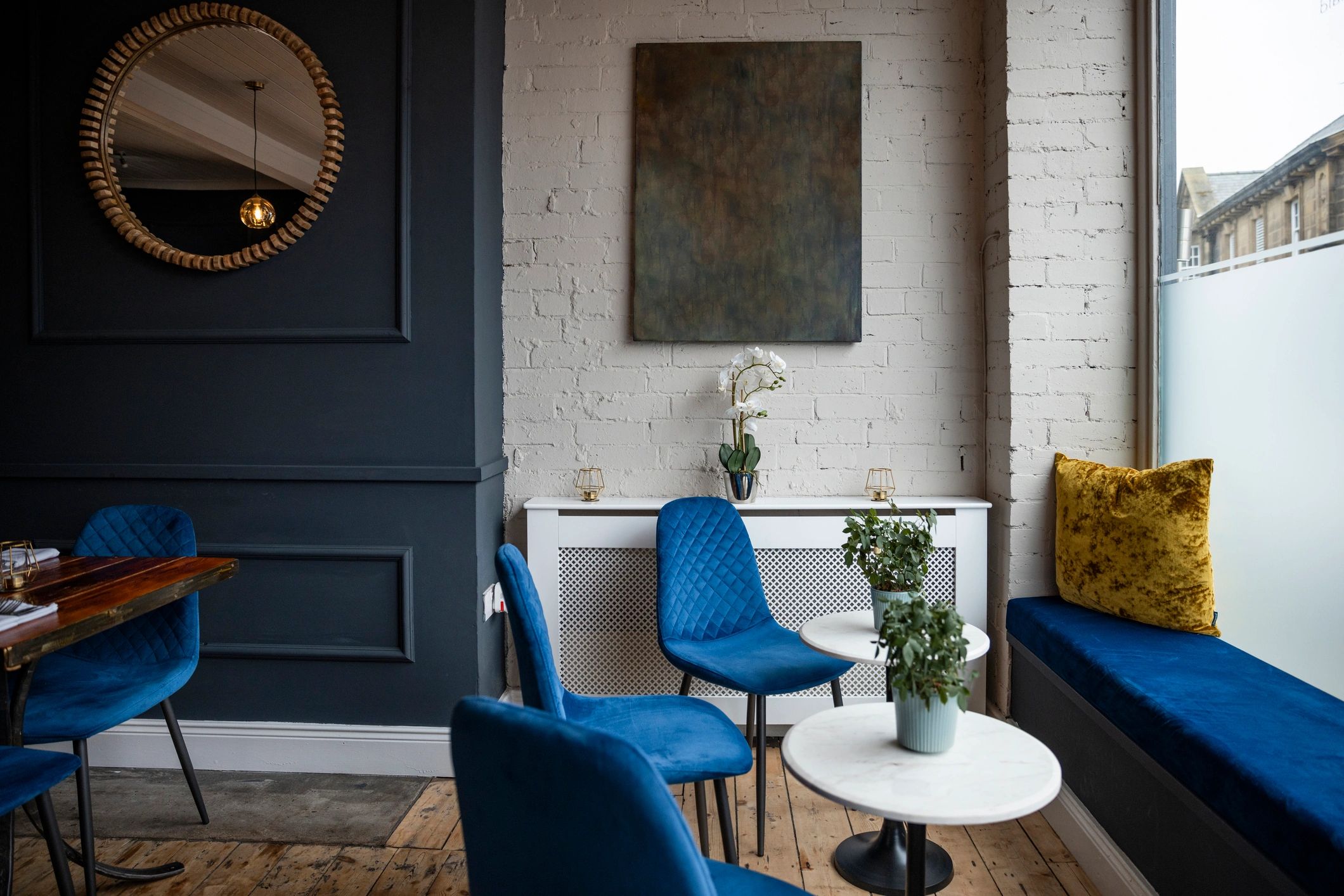 Comfortable lounge area with armchairs and warm lighting