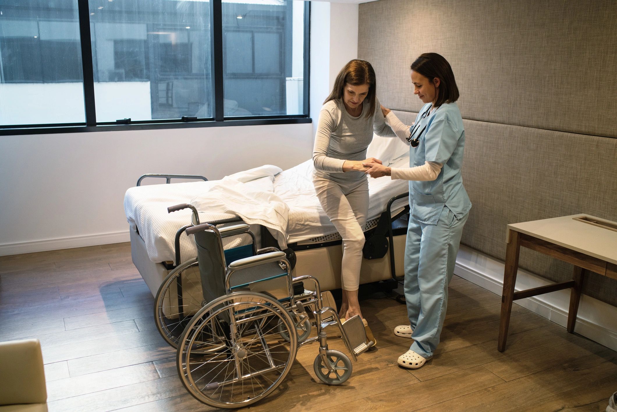 Care staff member supporting an older resident